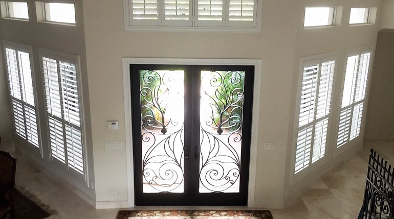 Las Vegas foyer with glass doors and interior shutters